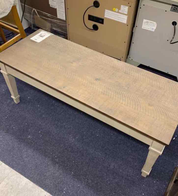 Solid wood coffee table on the outlet floor