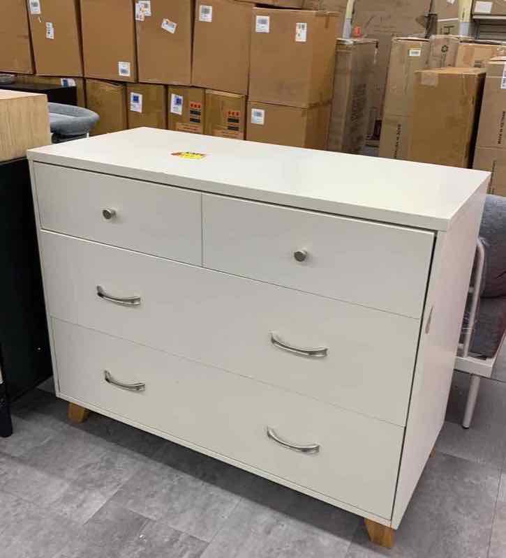 White four-drawer dresser at 123 Home Outlet