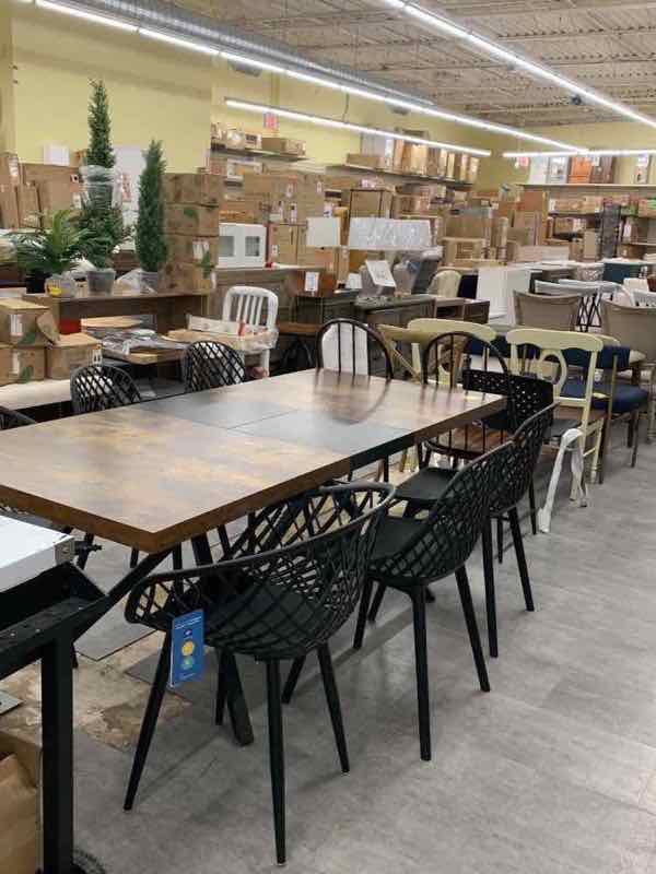 123 Home Outlet warehouse interior with stocked aisles
