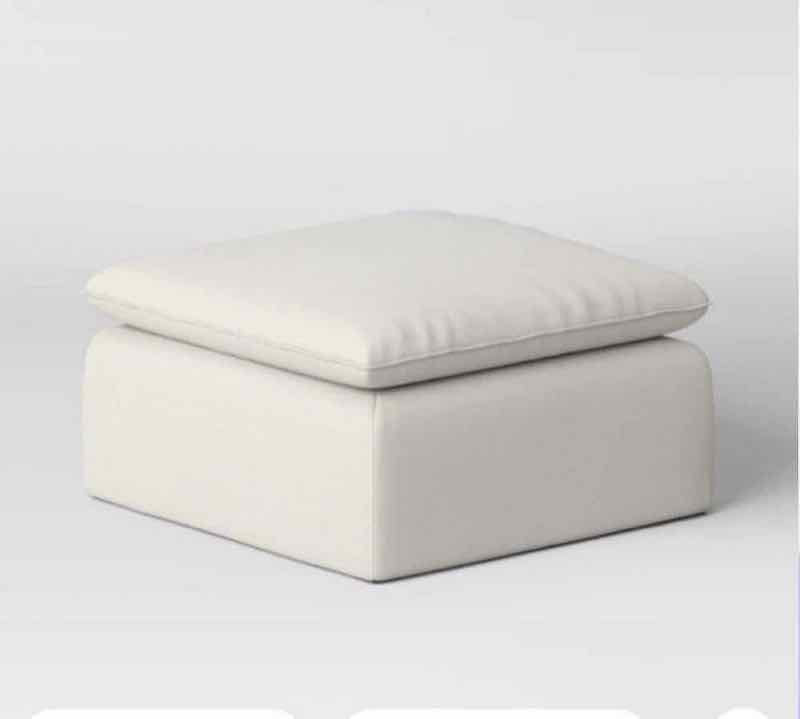Cream canvas modular sofa ottoman with French-seam upholstery