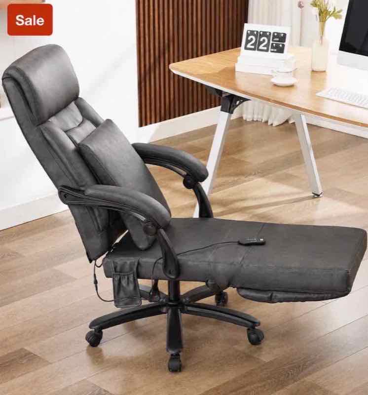 High-back reclining executive office chair with footrest