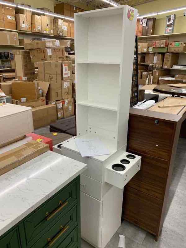 Tall white bookshelf with adjustable shelves
